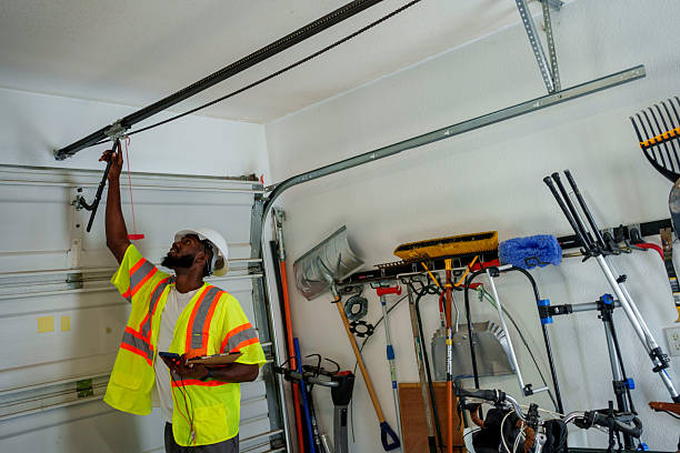 Professional Garage Door Panel Replacement technician working in Adams County County, IA
